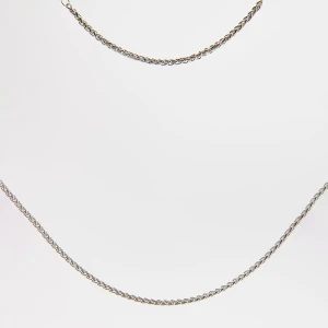 Zestaw: naszyjnik i bransoletka w kolorze srebrnym House