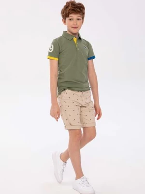 Zielona bluzka polo z krótkim rękawem dla chłopca Minoti