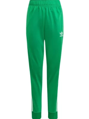 Zielone spodnie treningowe z ikonicznymi paskami Adidas Originals