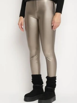 Złote Legginsy z Ekoskóry z Wysokim Stanem i Wsuwanymi Kieszeniami Rievalia