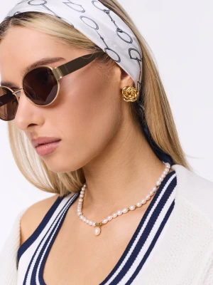 Złote okulary w owalnym kształcie TARANKO