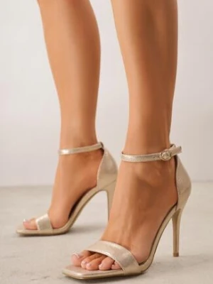 Złote Sandały na Szpilce z Paskiem Wokół Kostki Trisven goodin