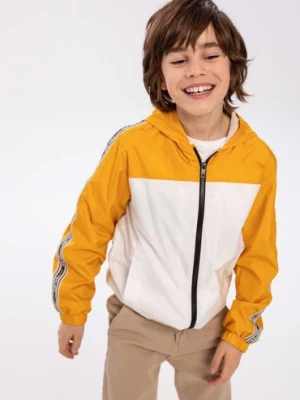 Żółta kurtka typu wiatrówka dla chłopca z kapturem Minoti